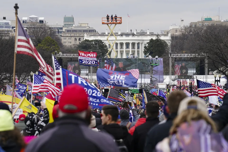 FILE - Trump supporters participate in a rally in Washington, Jan. 6, 2021, that some blame for fueling the attack on the U.S. Capitol. On Thursday, Feb. 8, the nation's highest court is scheduled to hear arguments in a case involving Section 3 of the 14th Amendment, which prohibits those who “engaged in insurrection or rebellion” from holding office. The case arises from a decision in Colorado, where that state's Supreme Court ruled that Trump violated Section 3 of the 14th Amendment and should be banned from ballot. (AP Photo/John Minchillo, File)