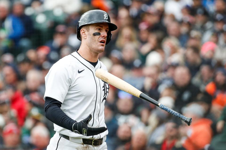 Detroit Tigers designated hitter Mark Canha (21) reacts to a strikeout against Oakland Athletics during the eighth inning of the home opening day at Comerica Park in Detroit on Friday, April 5, 2024.