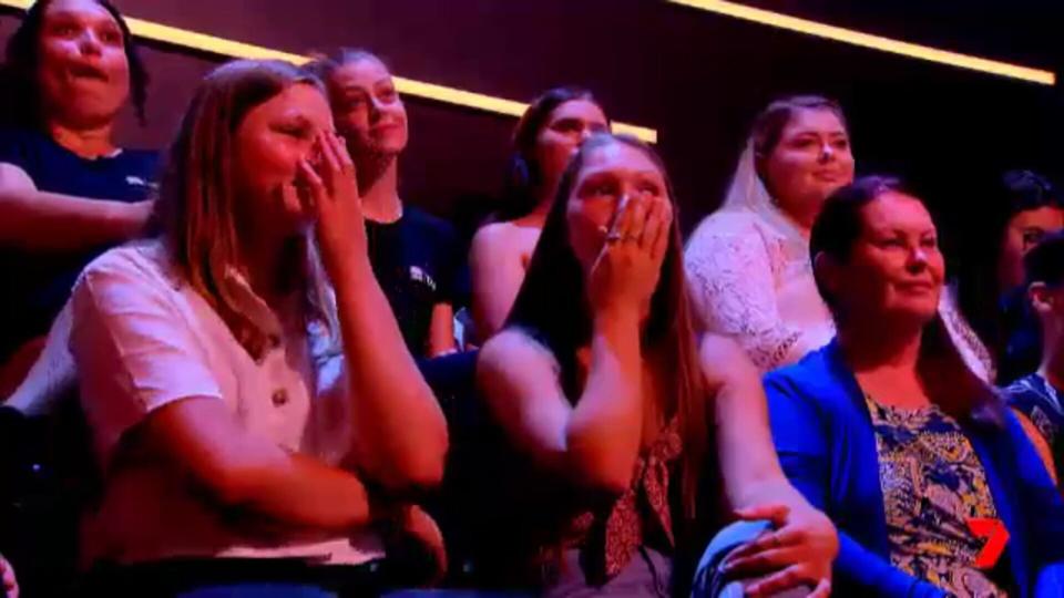 Jess' teary-eyed daughters watched on, as the lucky man is seen dropping to one knee and asking the ultimate question. Photo: Channel 7