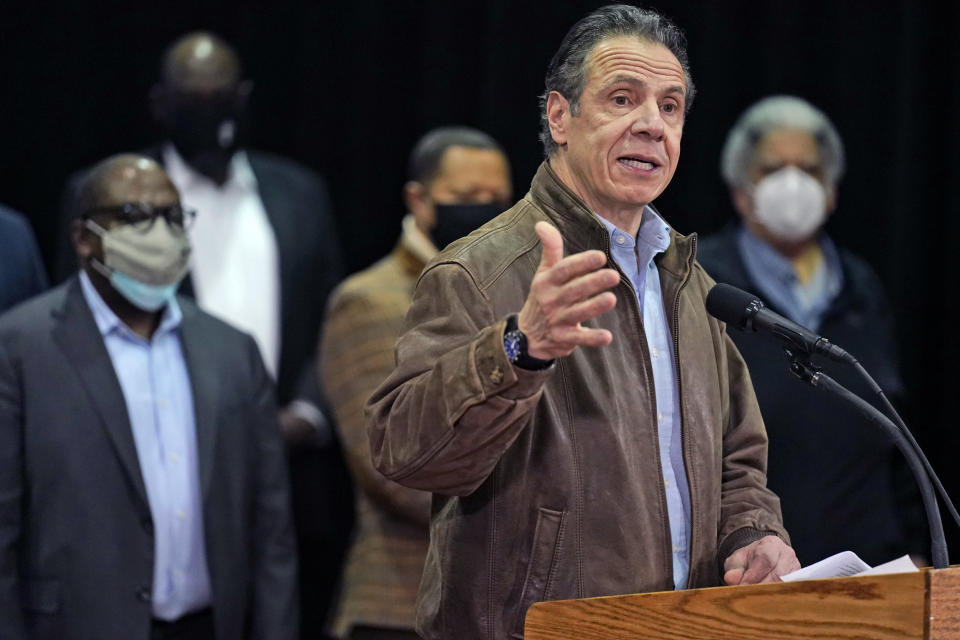 FILE - In this Wednesday, Feb. 24, 2021, file photo, New York Gov. Andrew Cuomo speaks during a press conference before the opening of a mass COVID-19 vaccination site in the Queens borough of New York. A former aide’s allegations that Gov. Cuomo subjected her to an unwanted kiss during years of sexual harassment have spurred calls for an investigation — and questions about who might meaningfully conduct one. (AP Photo/Seth Wenig, Pool, File)