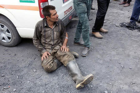 A man reacts near the site of an explosion in a coal mine in Golestan Province, in northern Iran, May 3, 2017. Tasnim News Agency/Handout via REUTERS