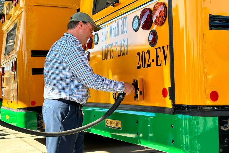 Modesto City Schools official charges a electric bus on Monday, July 31st. The electrification started last year and has been an 18 month process.