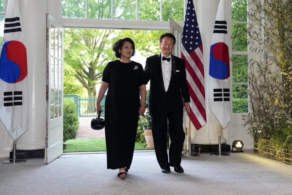 Victor Cha, former national foreign policy adviser, and his wife Hyun Cha, arrive for the State Dinner with President Joe Biden and the South Korea's President Yoon Suk Yeol at the White House, Wednesday, April 26, 2023, in Washington. (AP Photo/Alex Brandon)