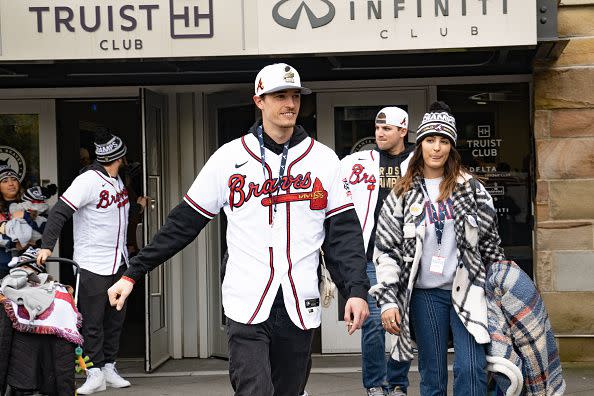 ATLANTA, GA - NOVEMBER 05: Fans cheer for Matt Fried of the Atlanta Braves as he gets on the buses before their World Series Parade at Truist Park on November 5, 2021 in Atlanta, Georgia. The Atlanta Braves won the World Series in six games against the Houston Astros winning their first championship since 1995. (Photo by Megan Varner/Getty Images)