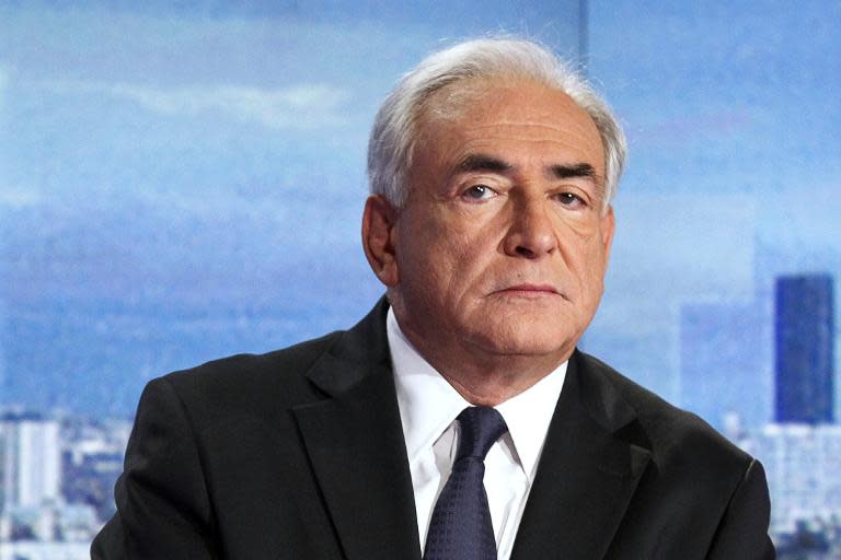 Ex-IMF chief Dominique Strauss-Kahn denies charges of "aggravated pimping"