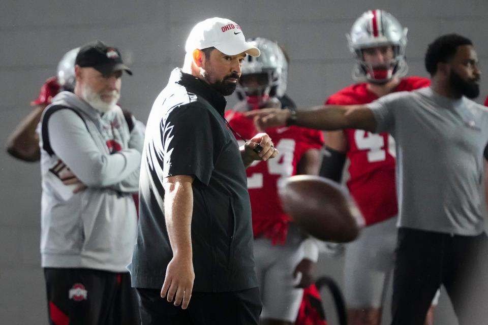 Mar 5, 2024; Columbus, OH, USA; Ohio State Buckeyes head coach Ryan Day watches his team during the first spring practice at the Woody Hayes Athletic Center.