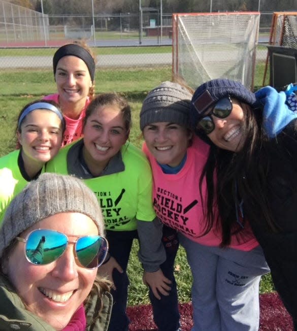 Former John Jay coach Kerri Roger takes a selfie with her field hockey players, including Cat Morgan, and co-coach Kristen Perry during the fall 2019 season.