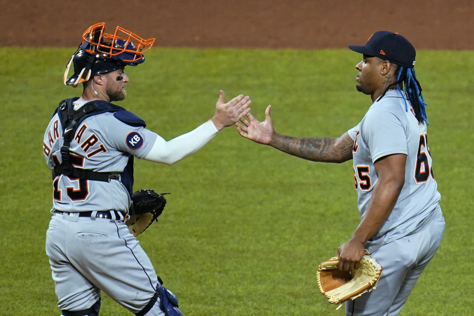 Detroit Tigers starting pitcher Gregory Soto, right, celebrates with catcher Tucker Barnhart after getting the final out of a baseball game against the Pittsburgh Pirates in Pittsburgh, Tuesday, June 7, 2022. The Tigers won 5-3. (AP Photo/Gene J. Puskar)