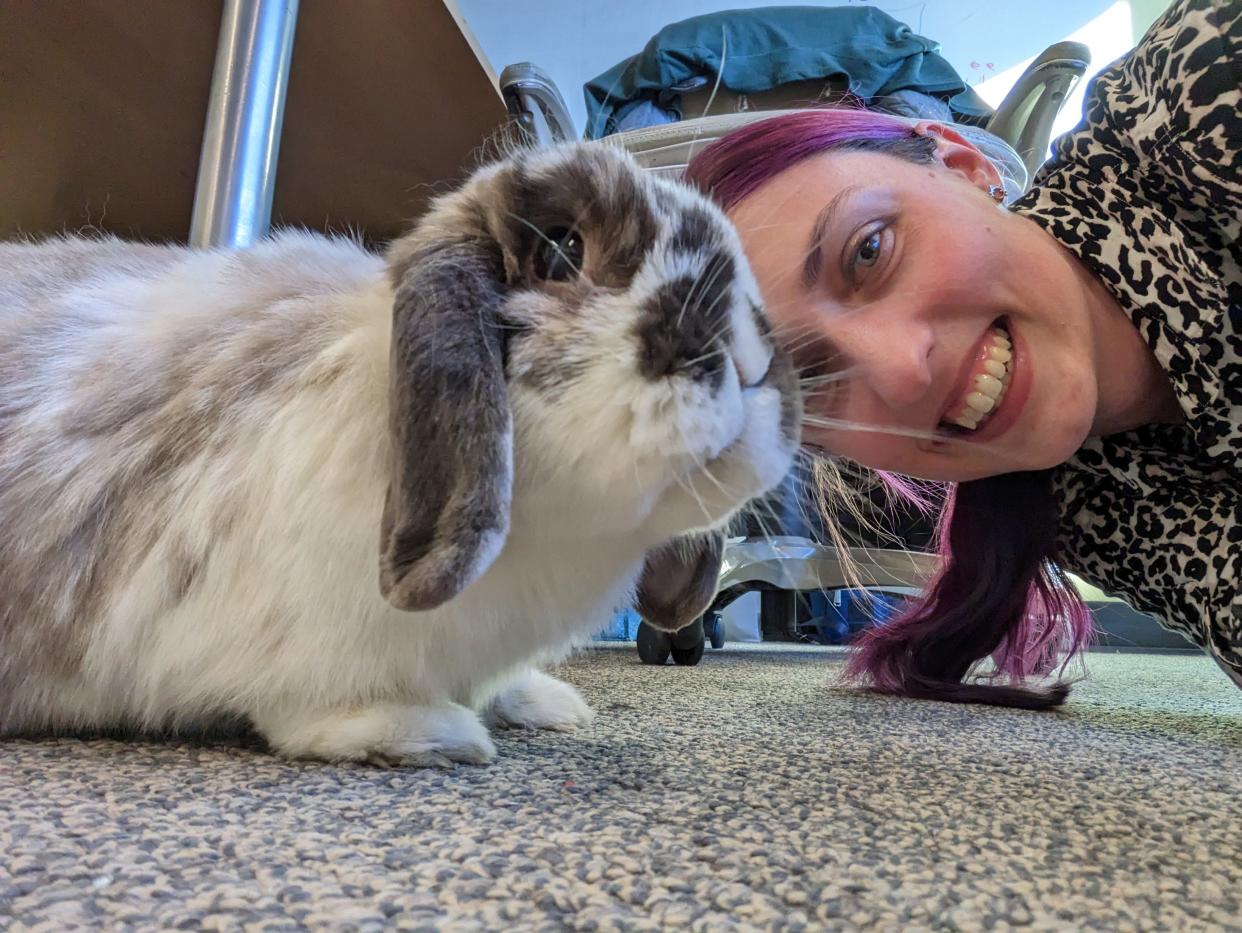 Dog the bunny poses with Renaissance Theaterworks marketing manager Maria Pretzl.