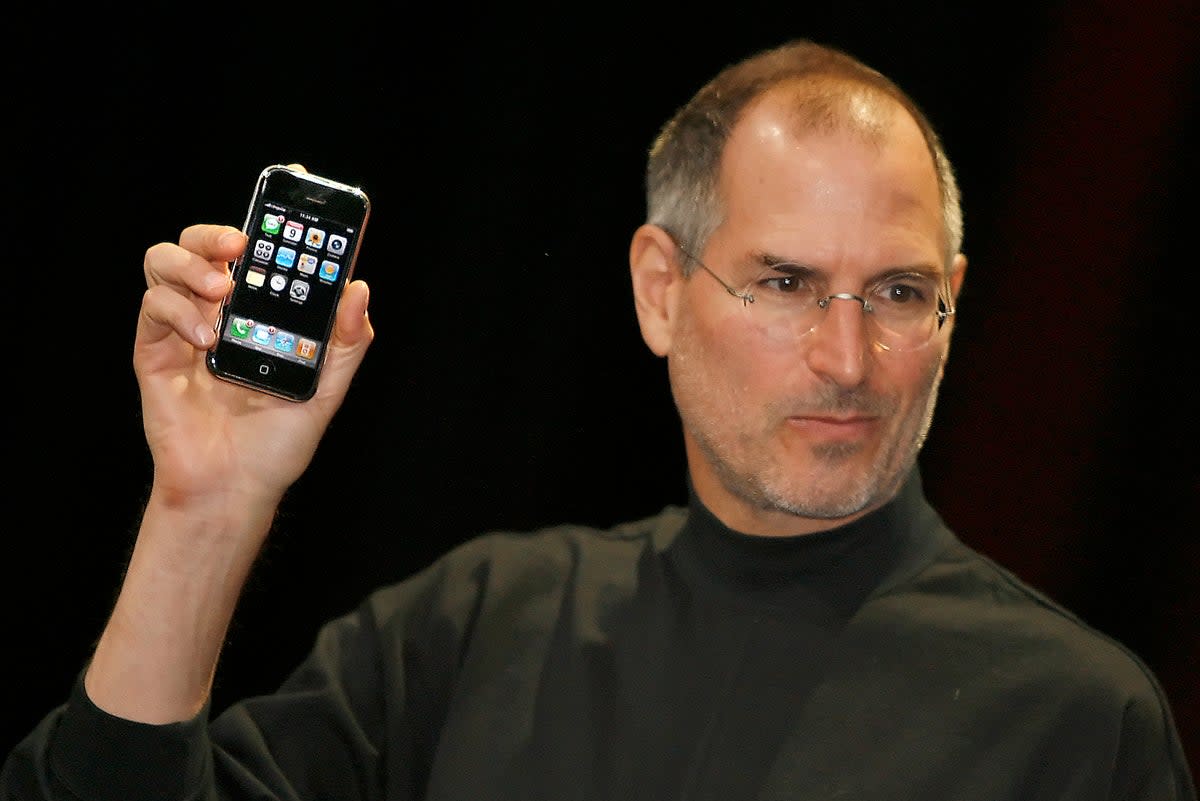 Steve Jobs unveils the iPhone in 2007  (AFP via Getty Images)