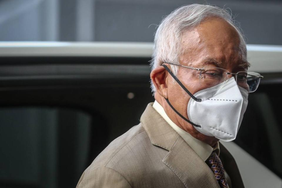 Datuk Seri Najib Razak leaves the Kuala Lumpur Court Complex after one of his criminal trials on July 14, 2022. — Picture by Yusof Mat Isa