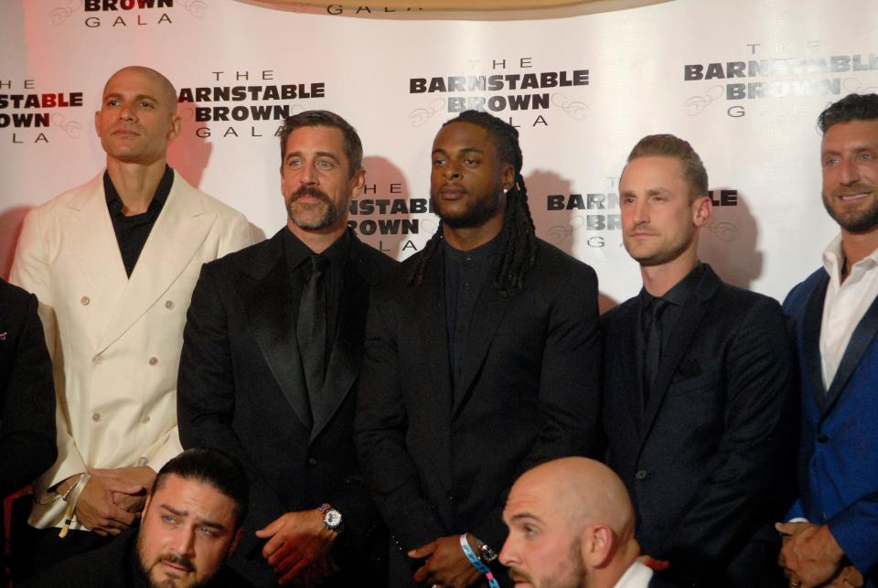 Aaron Rodgers and his football player friends pose on the red carpet at the 35th annual Barnstable Brown Gala on Friday night. May 03, 2024
