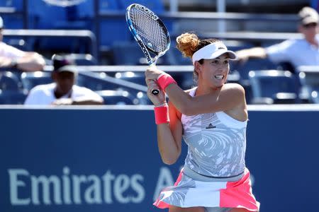 Aug 29, 2016; New York, NY, USA; Garbine Muguruza of Spain returns a shot to Elise Mertens of Belgium on day one of the 2016 U.S. Open tennis tournament at USTA Billie Jean King National Tennis Center. Anthony Gruppuso-USA TODAY Sports