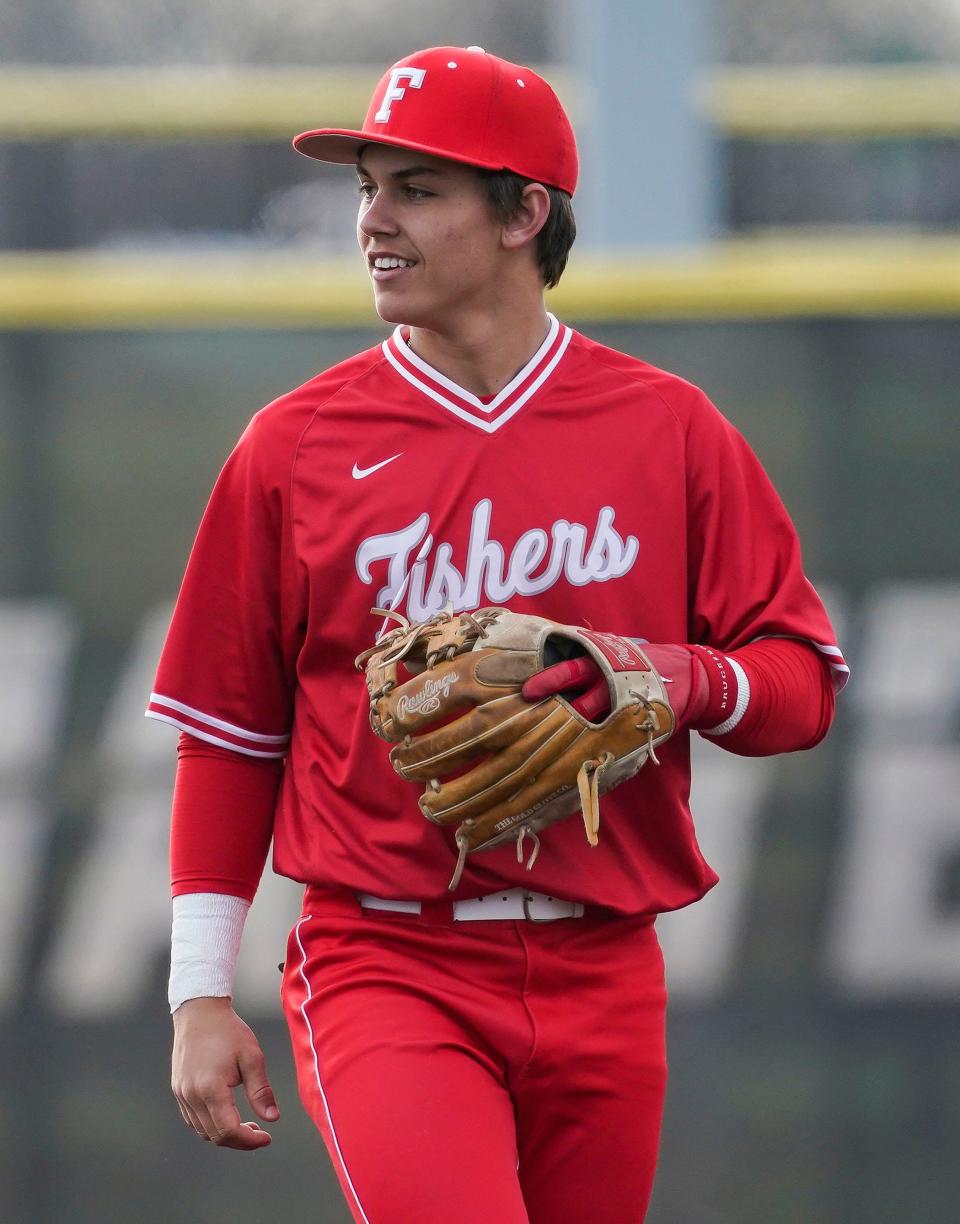 Fishers Tigers Gavin Kuzniewski (8) smiles during the game against the Zionsville Eagles on Thursday, April 6, 2023 at Grand Park in Westfield.