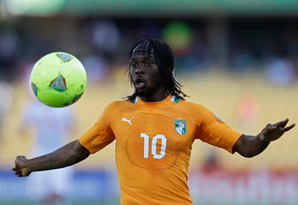 FILE - In this Jan. 26, 2013, file photo, Ivory Coast's Gervinho eyes the ball during their African Cup of Nations group D match with Tunisia at the Royal Bafokeng stadium in Rustenburg, South Africa. The two other teams in group D are Togo and Algeria. The Elephants had a comfortable qualification run under French coach Sabri Lamouchi, with a team filled with Europe-based talent including Manchester City's Yaya Toure. (AP Photo/Armando Franca, File)