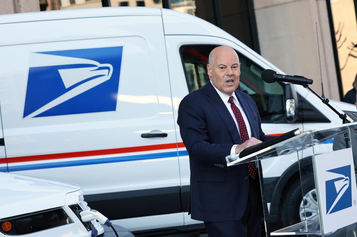 PHOTO: In this Dec. 20, 2022, file photo, Louis DeJoy, the U.S. Postmaster General, delivers remarks announcing the Postal Service's plan on implementing electric vehicles, at the Postal Service Headquarters in Washington, D.C.  (Kevin Dietsch/Getty Images, FILE)