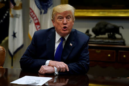 FILE PHOTO: U.S. President Donald Trump speaks with reporters at the White House in Washington, U.S. November 28, 2017. REUTERS/Jonathan Ernst