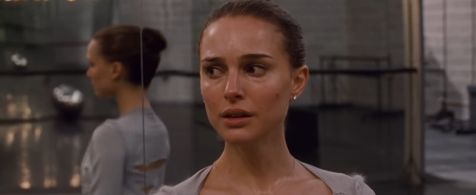 Nina from "Black Swan" is practicing in the dance studio, looking stressed