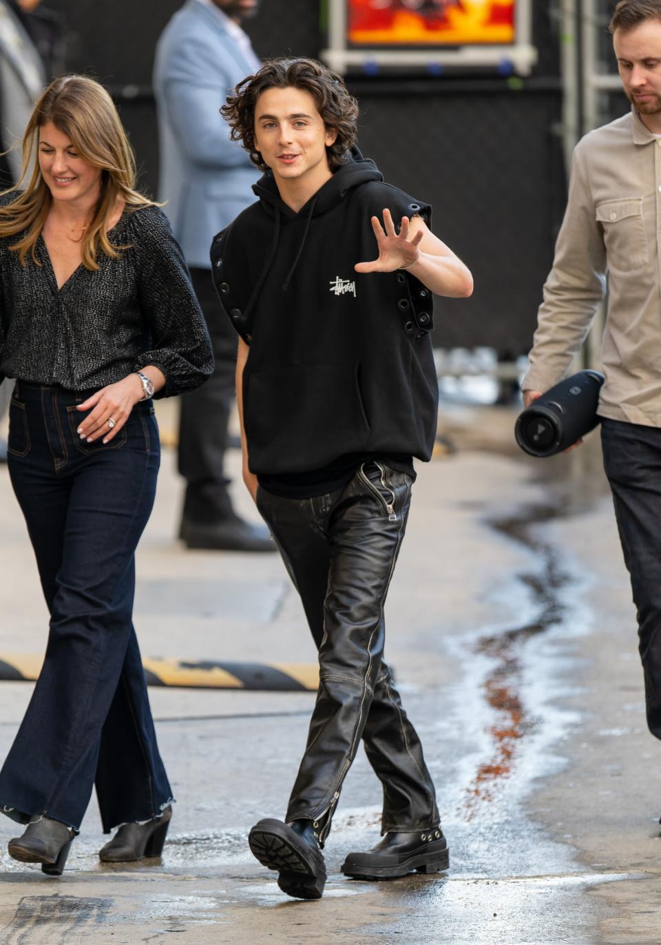 In February, Timothée Chalamet wore leather trousers and a Stüssy x Junya Watanabe hoodie on Jimmy Kimmel Live.