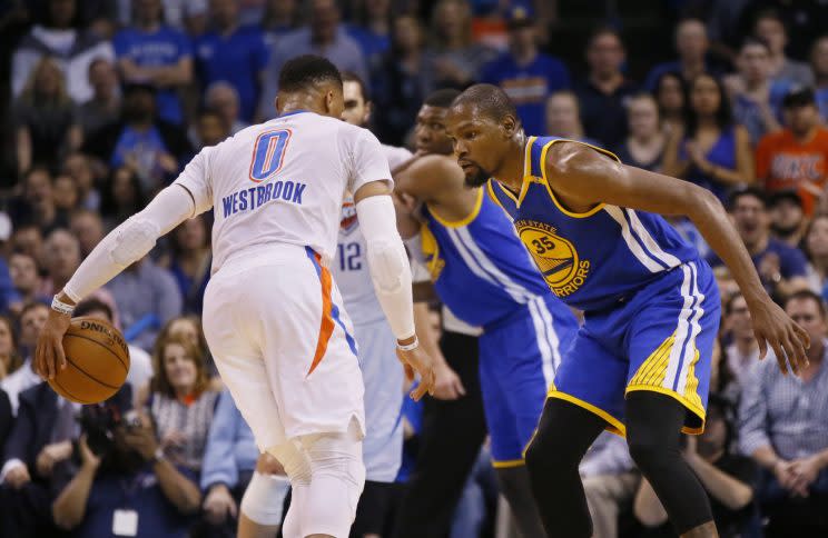 Russell Westbrook and Kevin Durant exchange pleasantries. (AP)