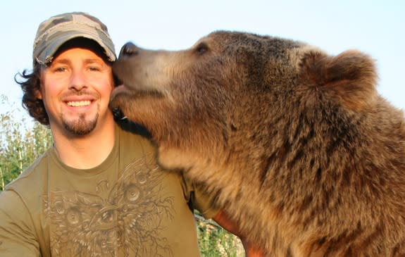 Naturalist Casey Anderson and his adopted bear Brutus. Brutus was the best "man" at Anderson's wedding.