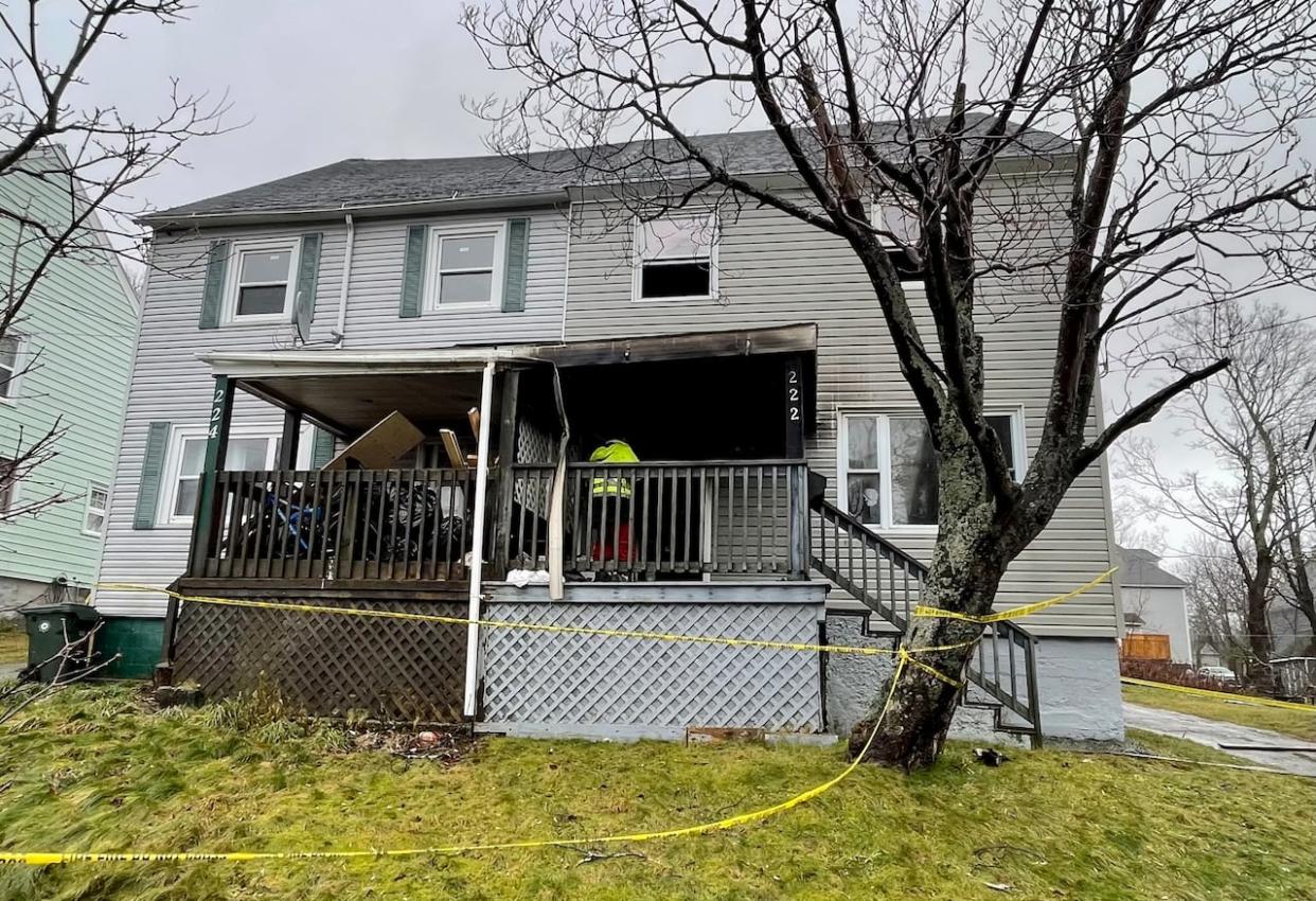 Cape Breton Regional Municipality is planning to regulate rooming houses after one of eight tenants living in one side of a Sydney duplex died in a 2022 fire. (Josefa Cameron/CBC - image credit)
