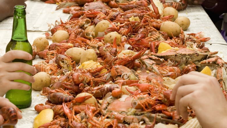 Close-up of a crawfish boil spread on a table