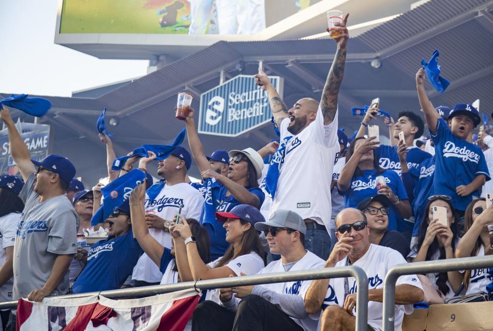 Dodgers fans cheer as the starting line-up is announced before Game 1 of the 2019 National League Division Series