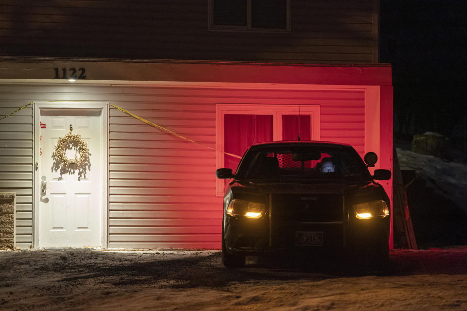 A private security officer sits in a vehicle, Tuesday, Jan. 3, 2023, in front of the house in Moscow, Idaho where four University of Idaho students were killed in November, 2022. Authorities said Wednesday, Jan. 4, that Bryan Kohberger, the man accused in the killings, has left a Pennsylvania jail in the custody of state police. The move means Kohberger could be headed to Idaho to face first-degree murder charges. (AP Photo/Ted S. Warren)