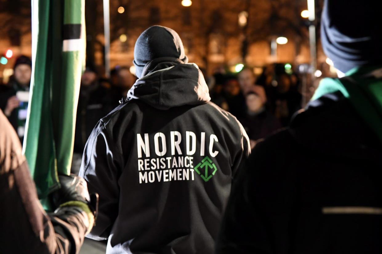 Members of the far-right group Nordic Resistance Movement march in Helsinki on Dec. 6, 2017, during centennial festivities of Finnish independence. <a href="https://www.gettyimages.com/detail/news-photo/members-of-far-right-group-nordic-resistance-movement-march-news-photo/887168026" rel="nofollow noopener" target="_blank" data-ylk="slk:Markku Ulander/AFP/Getty Images;elm:context_link;itc:0;sec:content-canvas" class="link ">Markku Ulander/AFP/Getty Images</a>