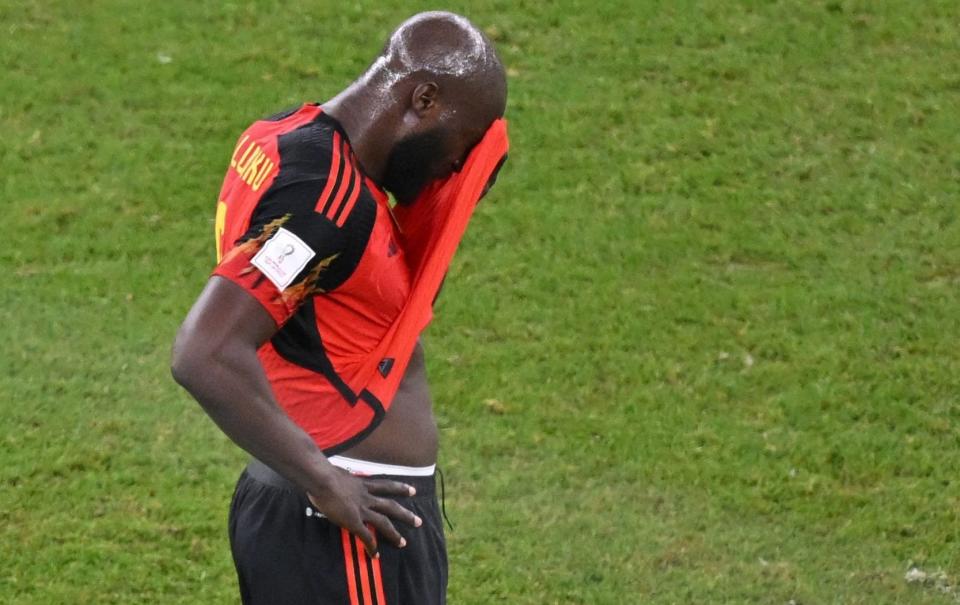 Romelu Lukaku cannot bear to look after the shock defeat - Glyn Kirk /AFP