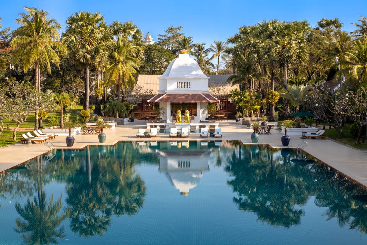 Swimming laps in this vast, tree-lined pool is sure to make exercise more enticing (Raffles Grand D’angkor)