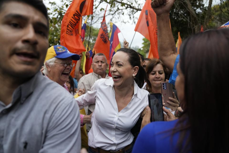 Opposition leader and presidential hopeful Maria Corina Machado, who is banned from running for office, attends a rally where she asked supporters to keep the faith, in San Antonio, Venezuela, April 17, 2024. (AP Photo/Ariana Cubillos)