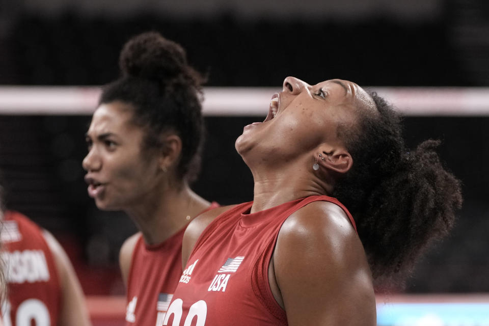 Haleigh Washington, of the United States, shouts in celebration of her team's 3-2 victory over Turkey, at the end of a women's volleyball preliminary round pool B match, at the 2020 Summer Olympics, early Friday, July 30, 2021, in Tokyo, Japan. (AP Photo/Manu Fernandez)