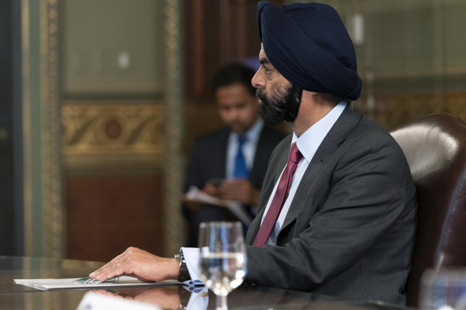 Ajay Banga, chairman of Mastercard, listens during a meeting with Vice President Kamala Harris and business CEO's about economic development in the Northern Triangle, Thursday, May 27, 2021, from Harris' ceremonial office on the White House complex in Washington. (AP Photo/Jacquelyn Martin)