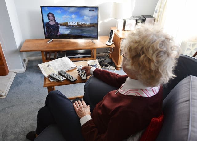 Elderly women watching TV