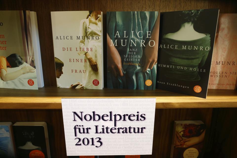 Books by Canadian writer Alice Munro, the 2013 Nobel Prize in Literature winner, are displayed during the book fair in Frankfurt, October 10, 2013. Munro won the Nobel Prize in Literature for being the "master of the contemporary short story," the award-giving body said on Thursday. REUTERS/Ralph Orlowski (GERMANY - Tags: MEDIA BUSINESS ENTERTAINMENT SOCIETY)