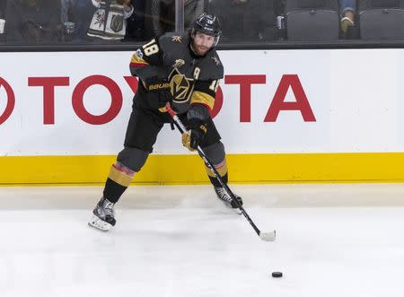 Oct 13, 2017; Las Vegas, NV, USA; Vegas Golden Knights left wing James Neal (18) moves the puck against the Detroit Red Wings during the third period at T-Mobile Arena. Detroit won 6-3. Mandatory Credit: Joshua Dahl-USA TODAY Sports