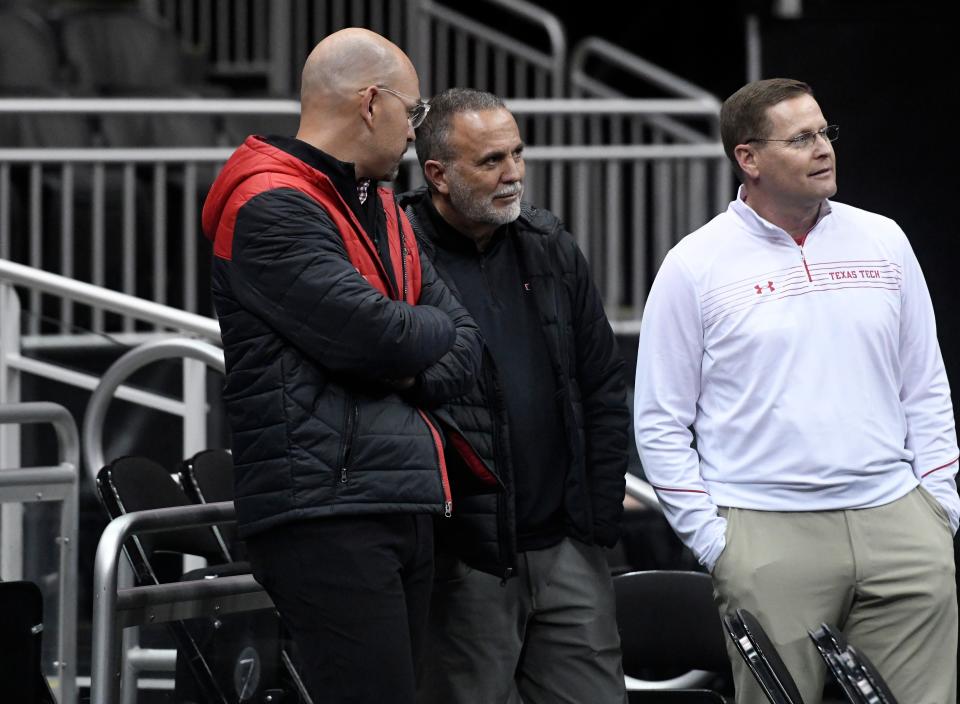 From left to right: Texas Tech finance and administration senior associate athletics director Jonathan Botros, Texas Tech external operations and strategic communications senior associate athletics director and Texas Tech director of athletics Kirby Hocutt attend the men's basketball practice ahead of the Big 12 basketball tournament, Tuesday, March 7, 2023, at T-Mobile Center in Kansas City.
