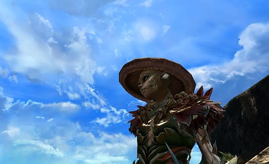 Sylvari character in front of blue sky backdrop