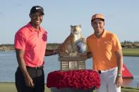 December 3, 2017; New Providence, The Bahamas; Tiger Woods (left) poses for a photo with winner Rickie Fowler (right) after the final round of the Hero World Challenge golf tournament at Albany. Mandatory Credit: Kyle Terada-USA TODAY Sports