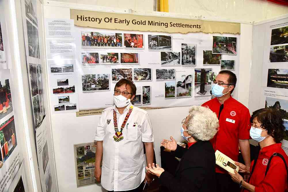 Chief Minister Datuk Patinggi Abang Johari Openg is briefed on the history of an early gold mining settlement in the Bau district December 31, 2020. — Picture courtesy of the Sarawak Information Department