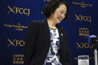 Tomoko Yoshino, the first female leader of Japanese Trade Union Confederation (RENGO) attends a press conference at Foreign Correspondents' Club of Japan Friday, Oct. 22, 2021, in Tokyo. Yoshino said Friday she will work to correct the gender gap in wages and working conditions to help empower women. (AP Photo/Eugene Hoshiko)