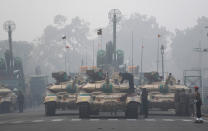 Indian army tanks are lined for the upcoming Republic Day parade in New Delhi, India, Thursday, Jan. 21, 2021. Republic Day marks the anniversary of the adoption of the country's constitution on Jan. 26, 1950. Thousands congregate on Rajpath, a ceremonial boulevard in New Delhi, to watch a flamboyant display of the country’s military power and cultural diversity. (AP Photo/Manish Swarup)