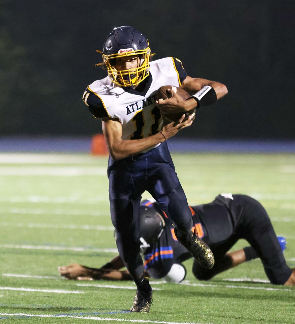 Atlantis Charter running back Devon Paradise scores a touchdown during a game versus Holbrook/Avon on Thursday, Sept. 22, 2022.  Holbrook won Thursday's home conference game against Atlantis by a score of 53-18.