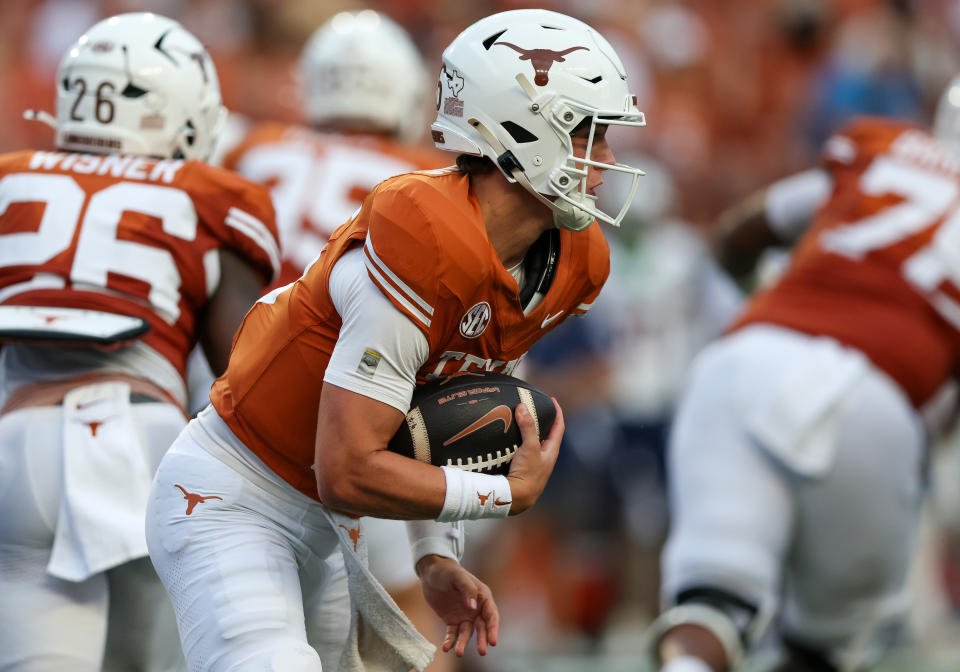 AUSTIN, TX – SEPTEMBER 14: Texas Longhorns quarterback Arch Manning (16) runs with the ball for a touchdown during the first half of the game against the UTSA Roadrunners on September 14, 2024 at Darrell K Royal – Texas Memorial Stadium in Austin, TX. (Photo by Adam Davis/Icon Sportswire via Getty Images)