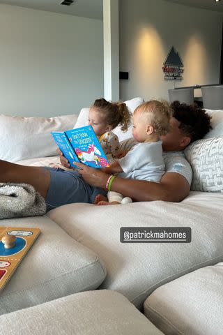 <p>Instagram/brittanylynne</p> Patrick Mahomes reads to his children ahead of an NBA date with wife Brittany Mahomes