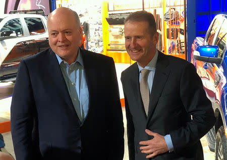 The President and CEO of Ford Motor Company Jim Hackett, poses with Volkswagen CEO Herbert Diess at the North American International Auto Show in Detroit, Michigan, U.S., January 14, 2019. REUTERS/Ben Klayman