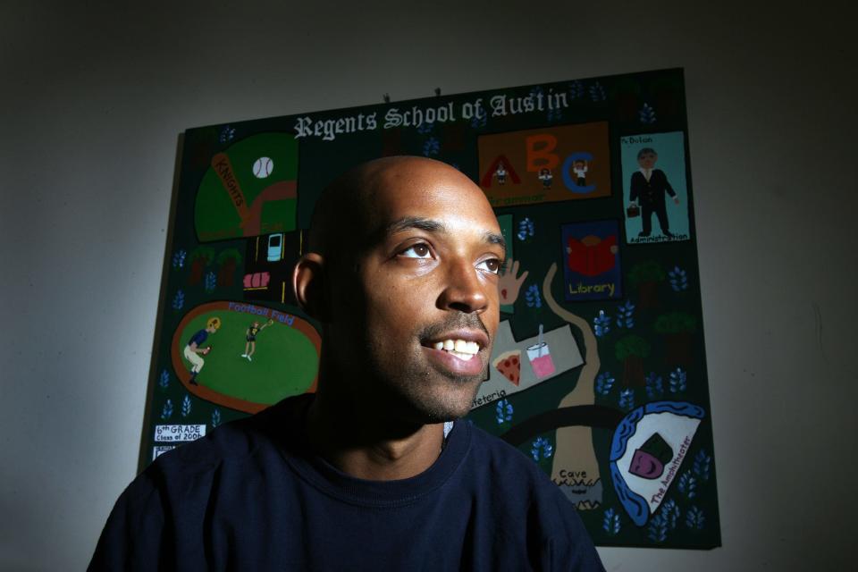 Former UT basketball star Terrence Rencher poses for a photo in 2007 at Regents High School in Austin, where he was the boys basketball coach.