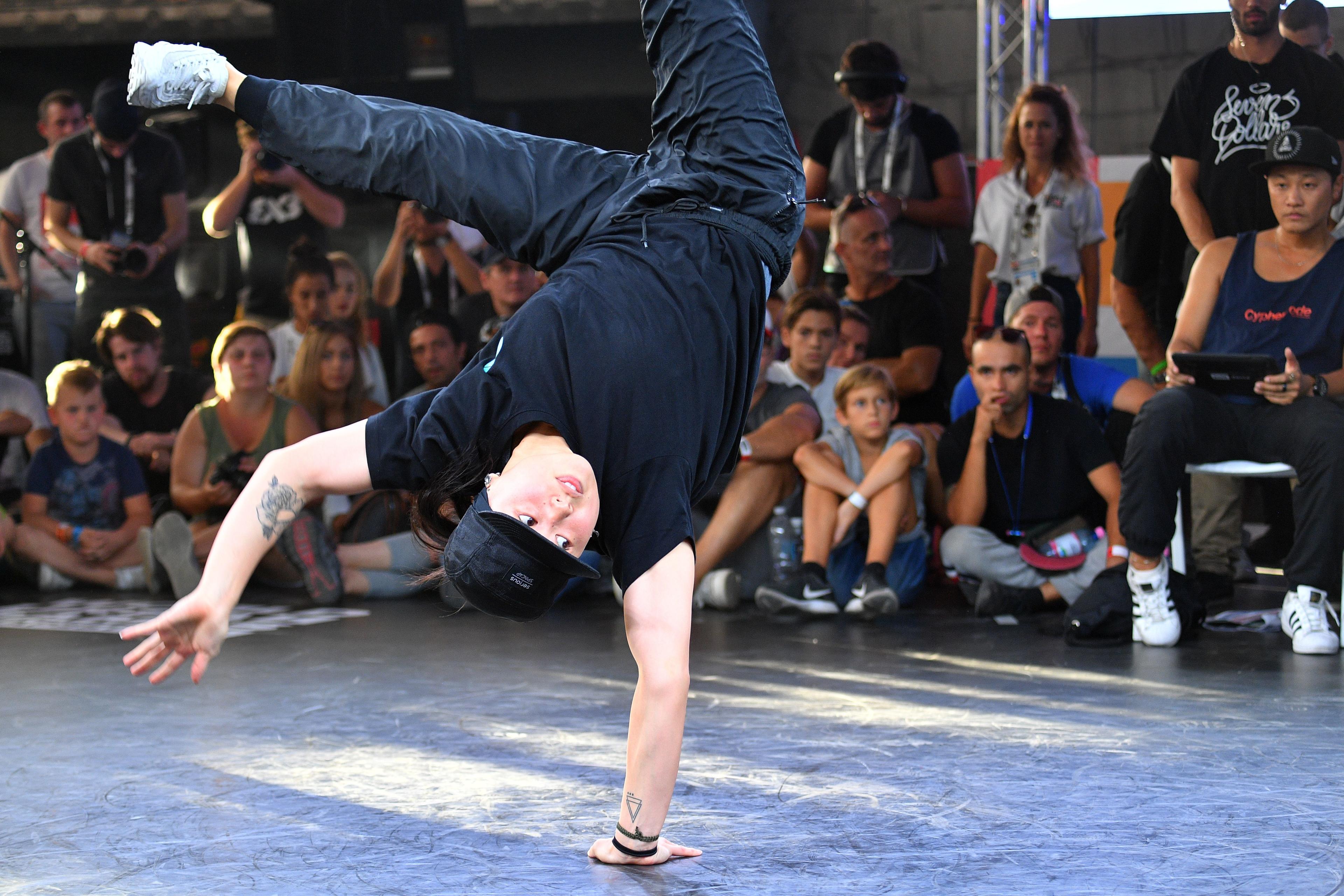 Sunny (Grace Choi) from the US performs on the stage of the break dance final at the World Urban Games in Budapest, Hungary on September 14, 2019. - The World Urban Games (WUG) is a three-day multi-sport event featuring competition and showcase sports of the best street-athletes of the World, alongside a cultural festival here. (Photo by ATTILA KISBENEDEK / AFP)        (Photo credit should read ATTILA KISBENEDEK/AFP via Getty Images)